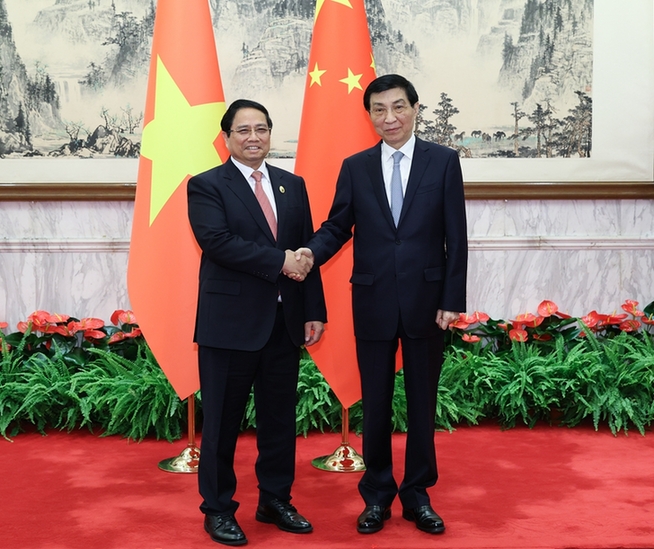 王滬寧會見越南總理范明政